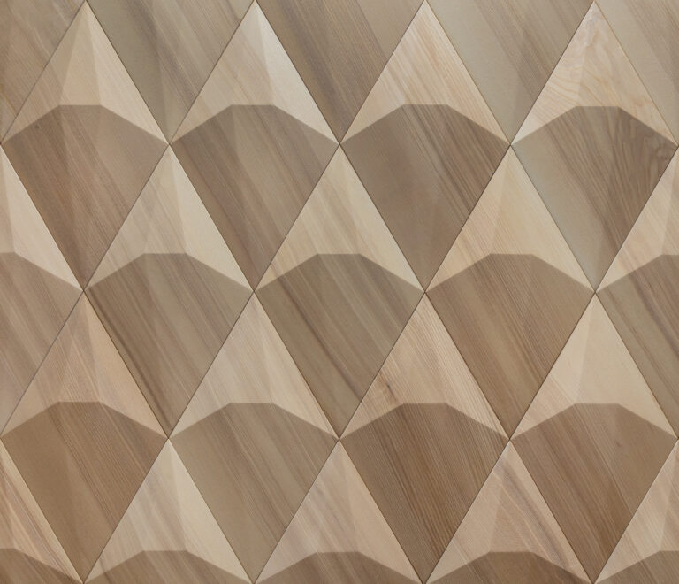 Decorative light wood wall panels in a 3D design with subtle geometric pattern