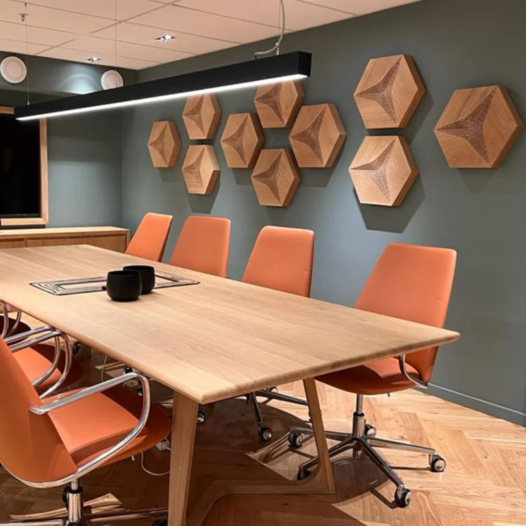 Wood acoustic wall panels used in a lounge area for comfort and clean acoustic design.