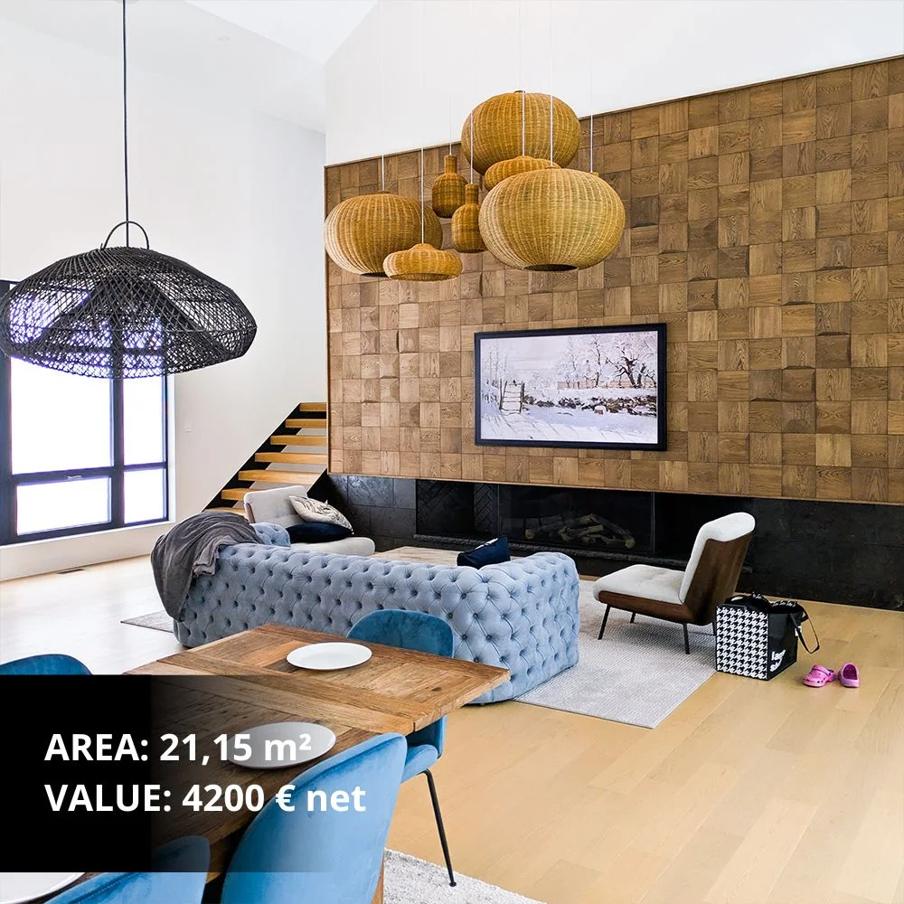 Spacious luxury living room featuring a large-scale 3D oak wood panel wall, a blue tufted sofa, and designer wicker pendant lights.