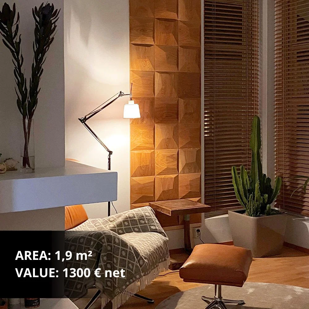 Vertical wood wall paneling behind a cozy reading corner with warm lighting