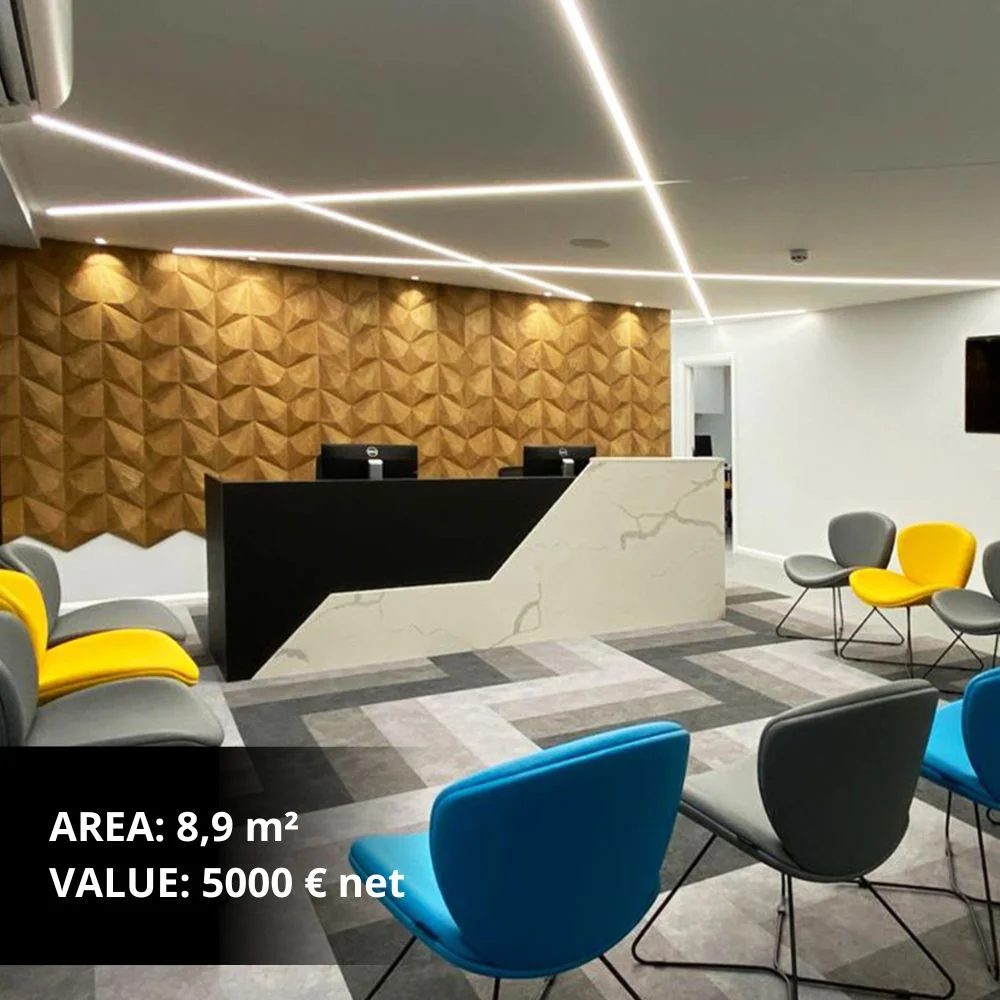 Modern office with decorative wooden wall panels behind reception