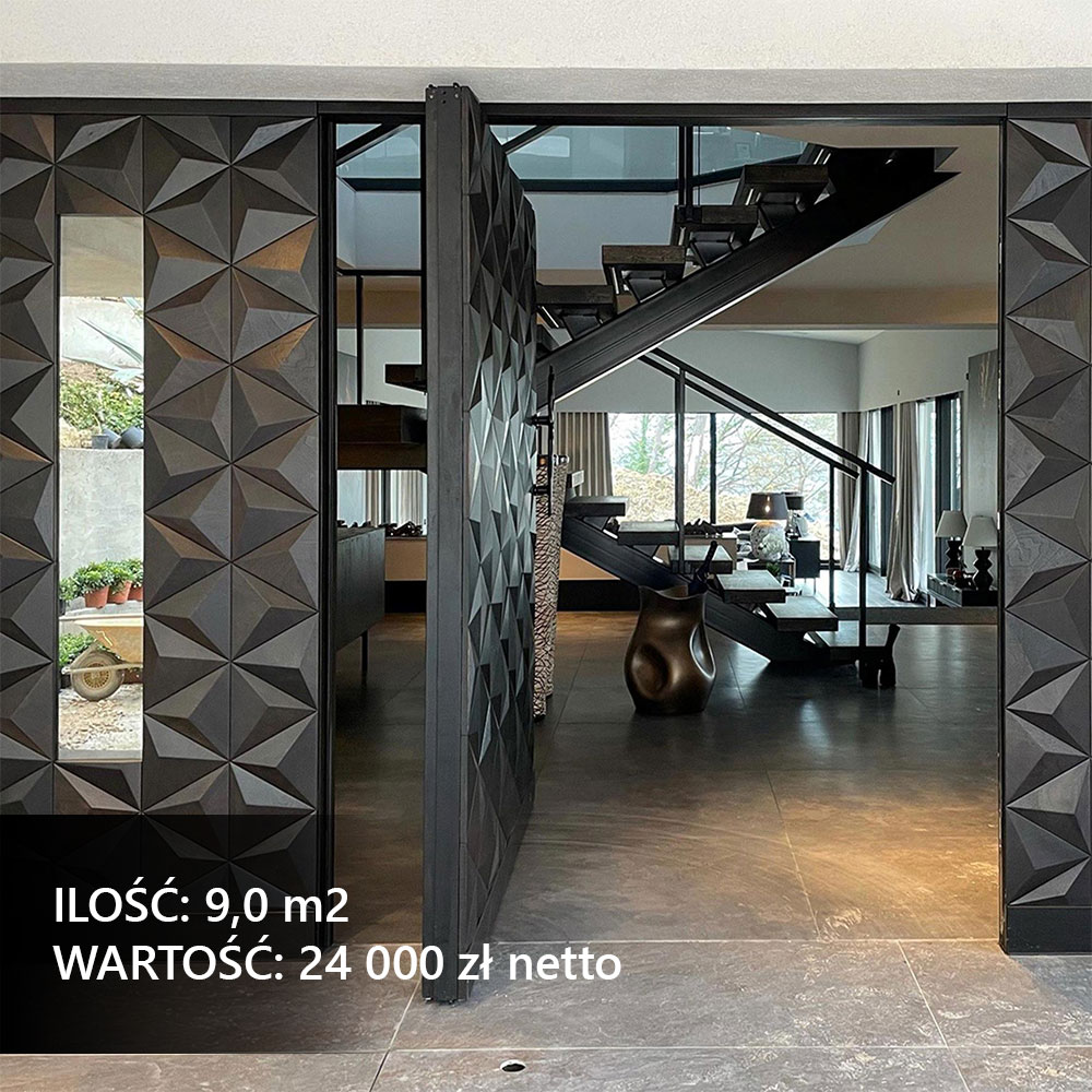 Panele ścienne 3D na drzwiach wejściowych w kolorze czarnym.
