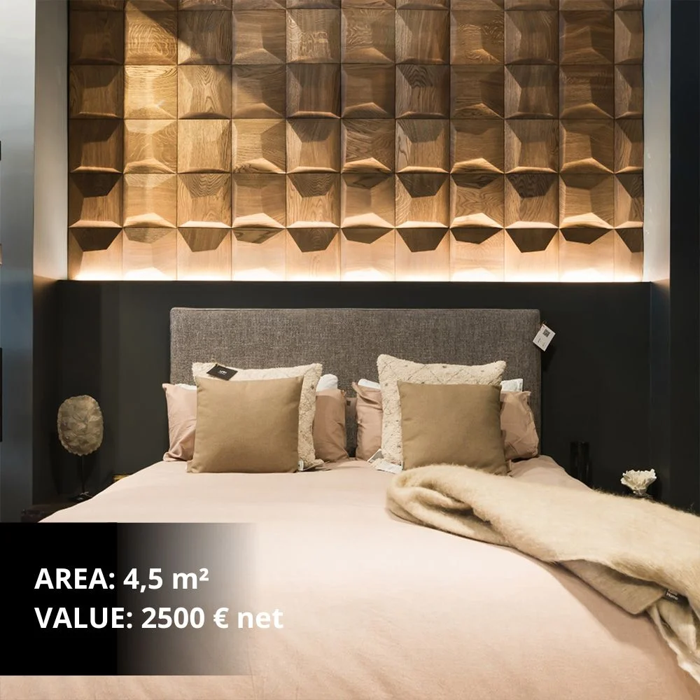 Bedroom with 3D wooden wall panels above the bed and integrated soft lighting
