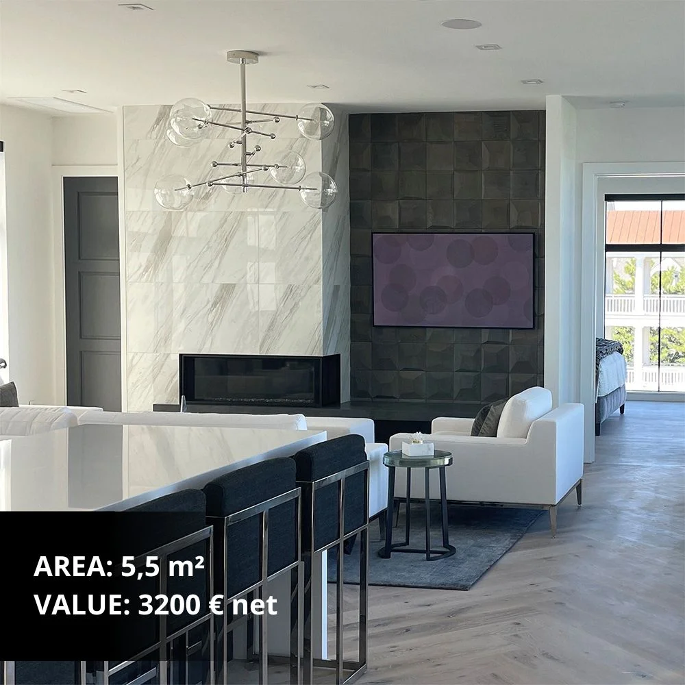 Minimalist kitchen and dining area with dark wood accent wall and marble surfaces