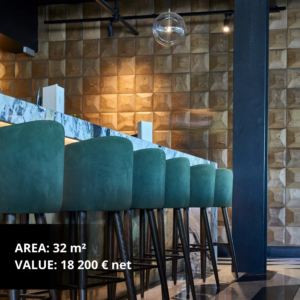 Wooden wall panels in a restaurant with green bar stools