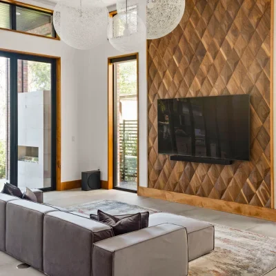 Cozy living room with wooden wall panels adding warmth